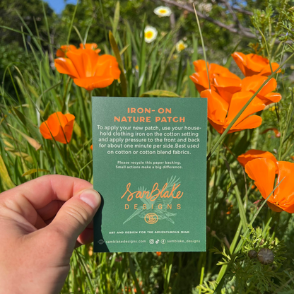 Back of iron on patch card displaying usage instructions