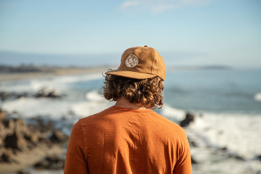 Sam Blake on Bodega Coast wearing Quail Hat Design